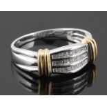 A contemporary diamond set two colour gold dress ring