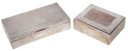 Two silver cigarette boxes