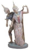 A Lladro gres stoneware figure of a Thai couple