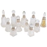 A collection of glass and silver perfume bottles