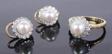 An attractive contemporary cultured pearl and diamond daisy cluster ring and the matching earrings