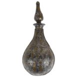 An interesting antique Middle Eastern silver overlaid brass powder flask