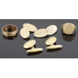 A pair of 18ct gold oval scroll cuff links