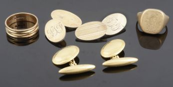 A pair of 18ct gold oval scroll cuff links