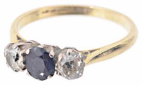A three stone sapphire and diamond set ring