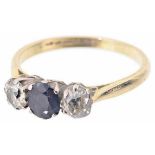 A three stone sapphire and diamond set ring