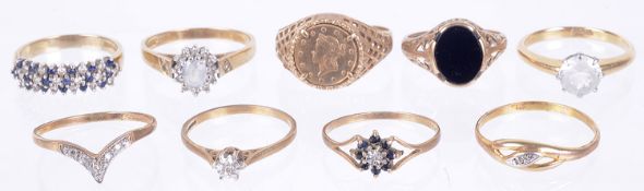 A sapphire set half eternity ring and a collection of various other gold rings