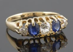 A sapphire and diamond Victorian style five stone gypsy ring