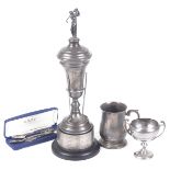 Two silver golfing trophies, a silver golfing tankard and three silver teaspoons