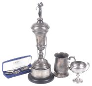 Two silver golfing trophies, a silver golfing tankard and three silver teaspoons