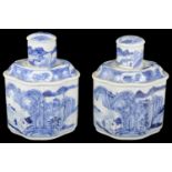 A pair of early 19th century large Chinese export ware blue and white tea poys and covers