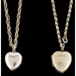 A heart shaped locket on gold chain and another