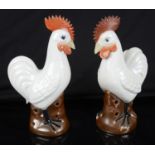 A pair of early 20th century export ware figures of roosters