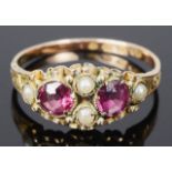 A delicate early Victorian garnet set and seed pearl ring