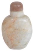 A 19th century Chinese pale green and russet jade snuff bottle