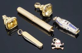 An interesting collection of gold and other charms including Victorian seals