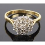 A small 18ct yellow gold and diamond cluster ring