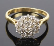 A small 18ct yellow gold and diamond cluster ring