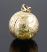 An unusual gold hinged locket of spherical form