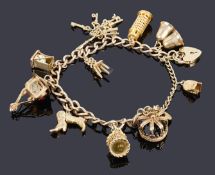 A 9ct gold charm curb link bracelet