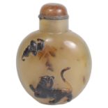 An amusing 19th century Chinese carved agate snuff bottle