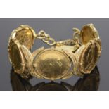 An 18ct gold bracelet formed of five articulated sovereign panels