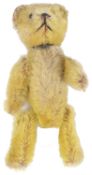 A 1930s Schuco teddy bear scent bottle