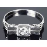A delicate Art Deco diamond set 'bow' ring
