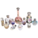 A collection of early 20th century and later silver mounted ceramic scent bottles