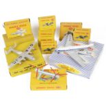 A collection of boxed Dinky fighter planes