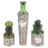 Three silver and emerald green glass perfume bottles