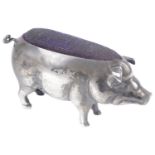An Edwardian silver novelty pin cushion in the form of a pig, hallmarked Birmingham 1905