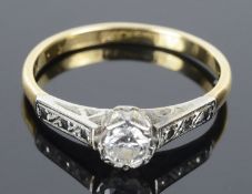 A delicate single stone diamond set ring