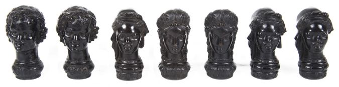 An interesting collection of African and other 'Bois durci' female heads/parasol handles