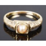 A late Georgian early Victorian pearl set hinged memorial ring