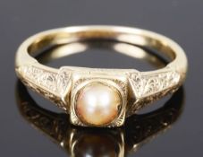 A late Georgian early Victorian pearl set hinged memorial ring