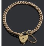 A 9ct gold curb link bracelet with heart locket