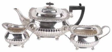 A George V three piece silver tea service, hallmarked Sheffield 1911 & London 1909