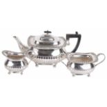 A George V three piece silver tea service, hallmarked Sheffield 1911 & London 1909