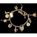 A Continental yellow metal charm bracelet