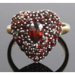 A charming Victorian garnet set heart ring