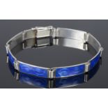 A Scandinavian silver and blue guillioche enamel panel bracelet