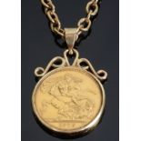 A mounted fine gold sovereign pendant on a 9ct gold chain