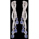 A pair of attractive Art Deco style sapphire and diamond long drop earrings
