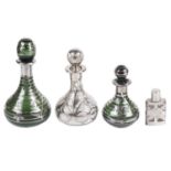 Two early 20th century green glass and white metal overlay perfume bottles and two others