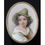 A late 19th century oval porcelain painted brooch
