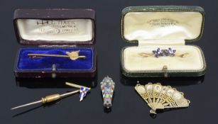 An interesting collection of Victorian and Edwardian pins, brooches and charms