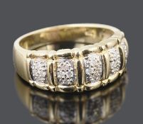 A contemporary Continental gents 14ct gold diamond set ring