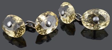 A pair of unusual facetted citrine cufflinks, c1900