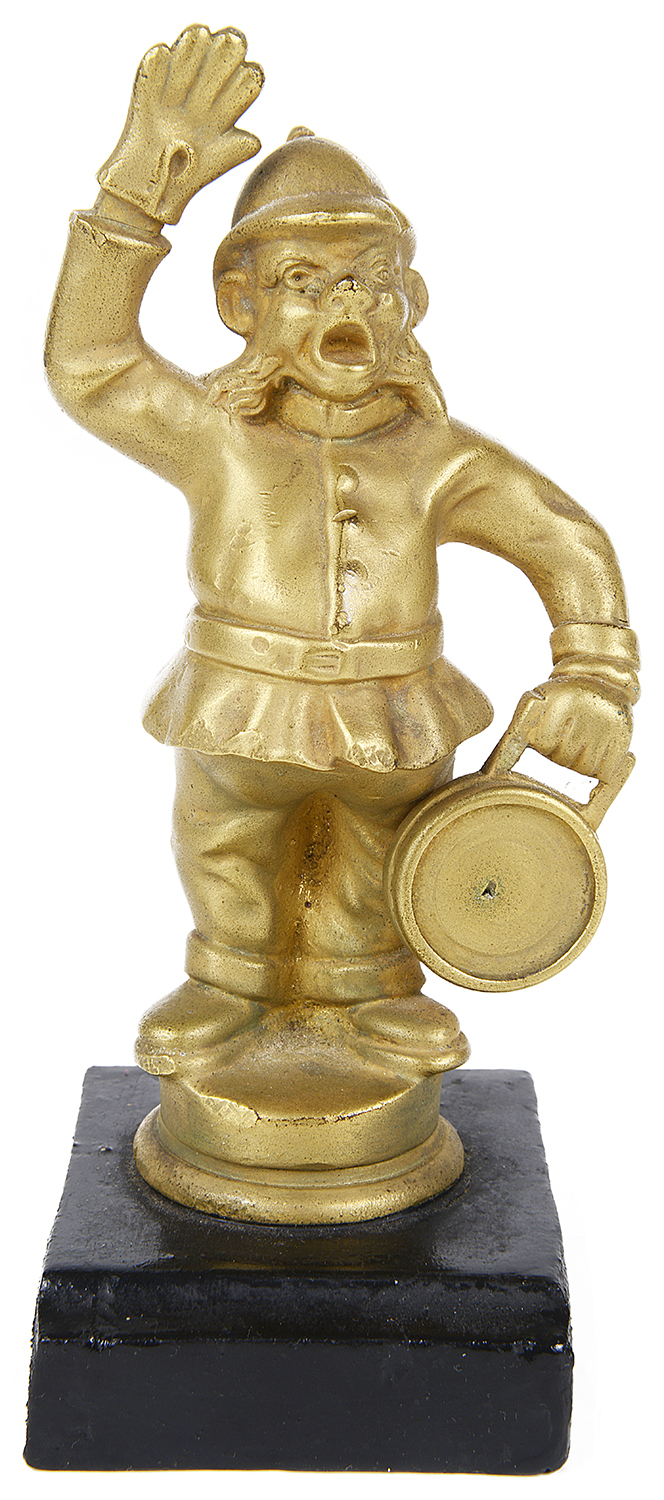 An amusing novelty gilt metal car mascot of a policeman